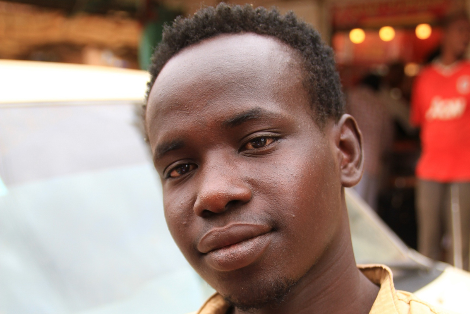 A Sudanese man looks at the camera