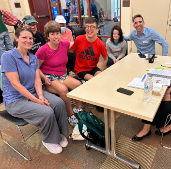 EnCircle staff and clients smile for the camera during an advocacy meeting
