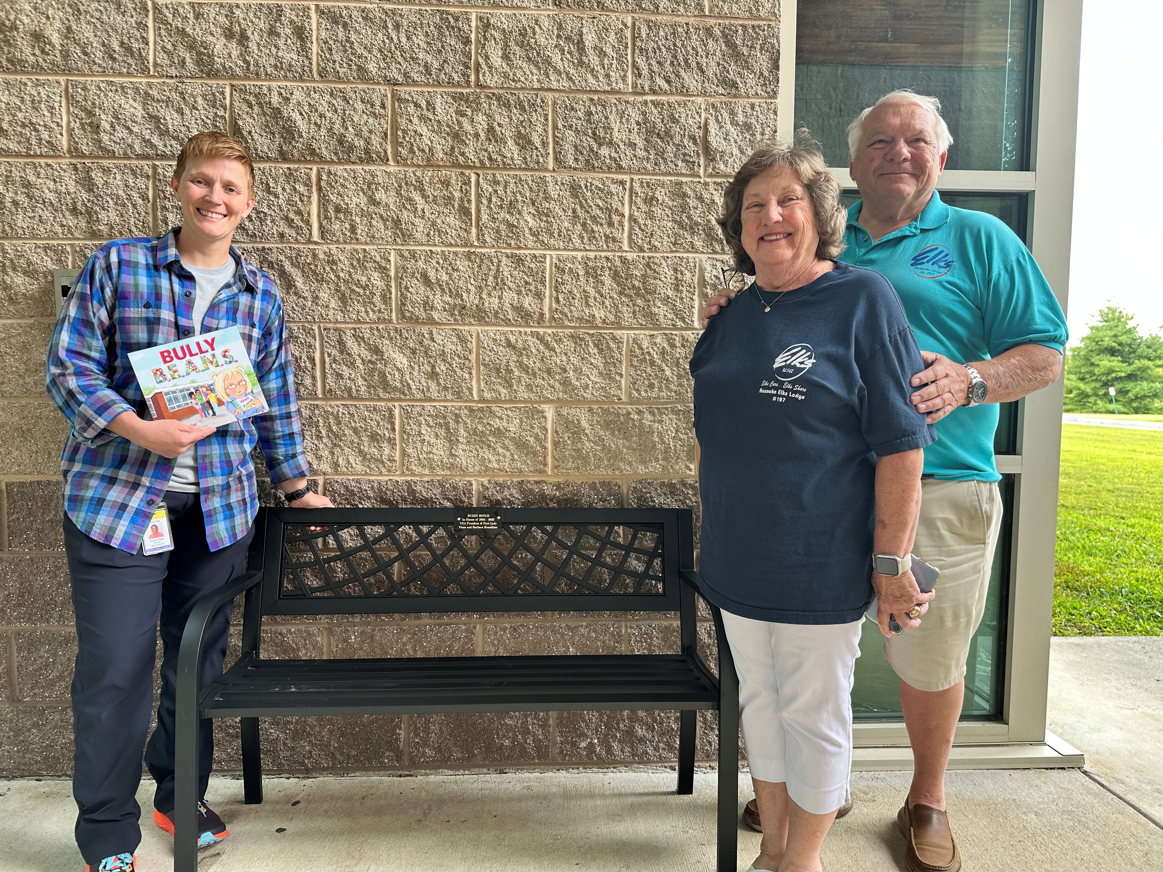 Becca, Vince, and Barbara with the bench