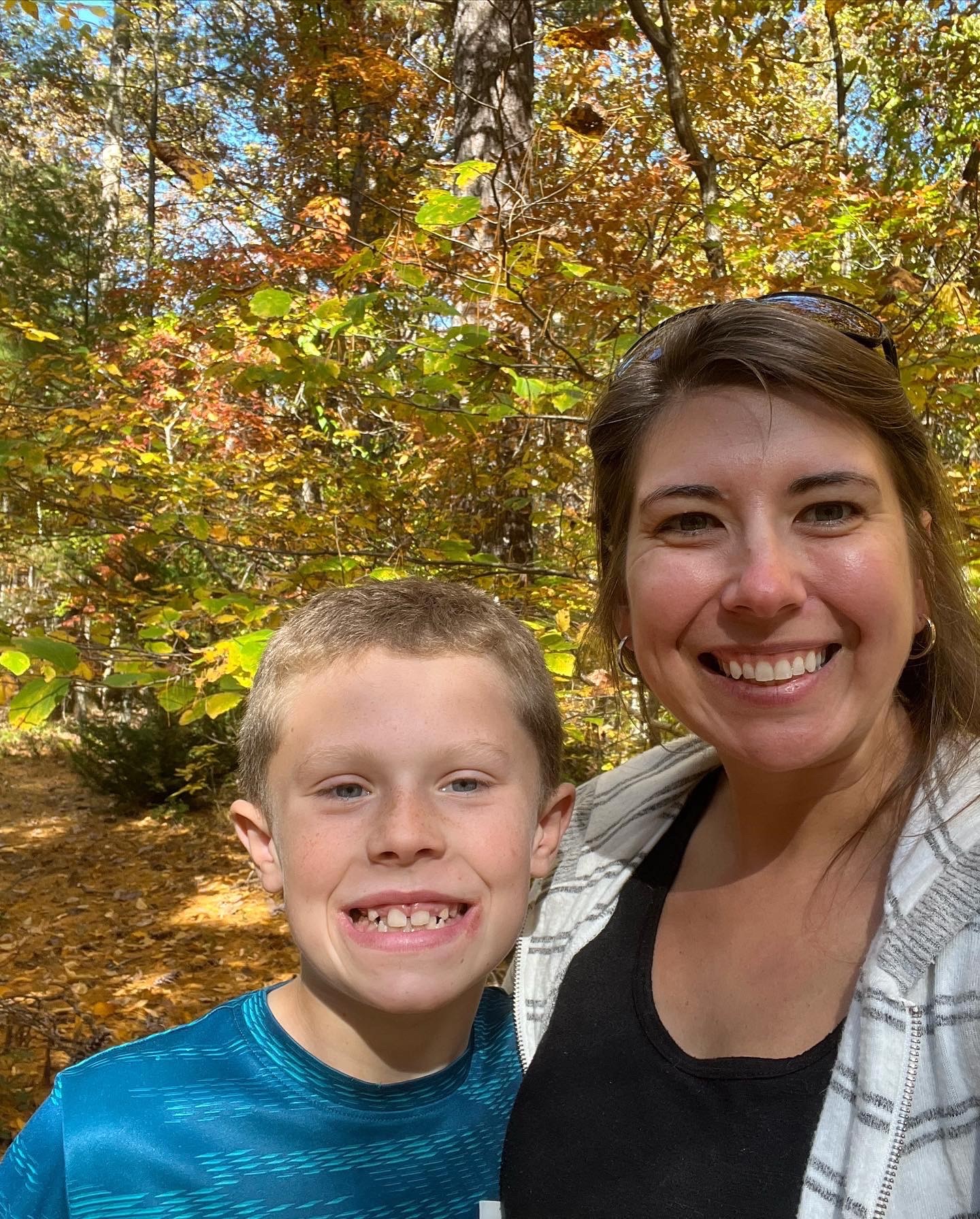 Shaun and his mother smile in a selfie