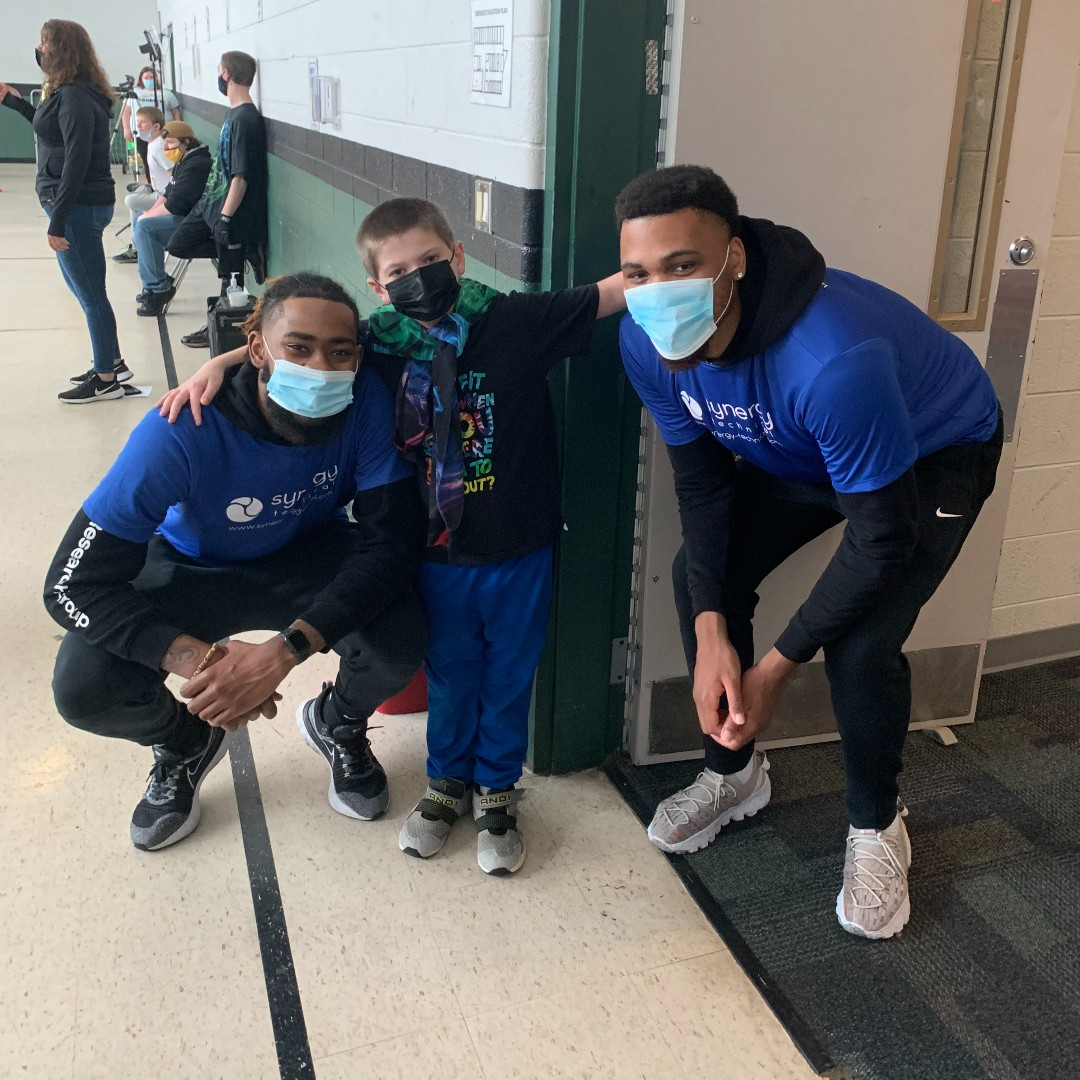 Mikeal Brown-Jones and Levi Stockard III pose with a Minnick Student